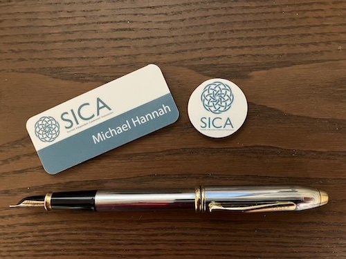 SICA membership badges and pen